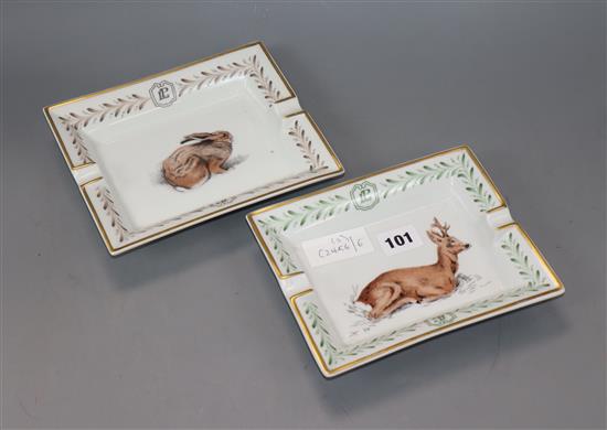 Hermes Paris. A pair of Laurent Perrier Hunt porcelain cigar ashtrays, stag and hare. One monogrammed XP